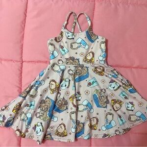 Adorable Beige Kids Dress with Cartoon Print